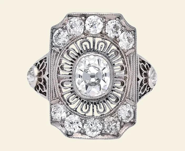 An Edwardian platinum antique engagement ring